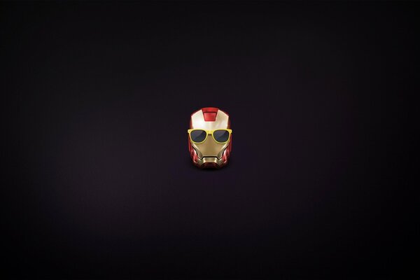 Miniature Iron Man s head on a black background