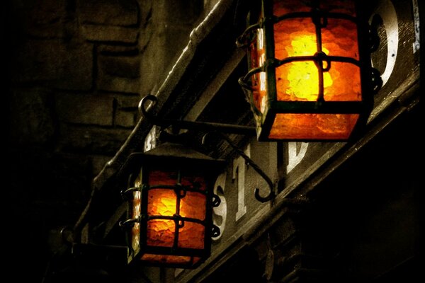 Vintage lanterns shine on the evening street