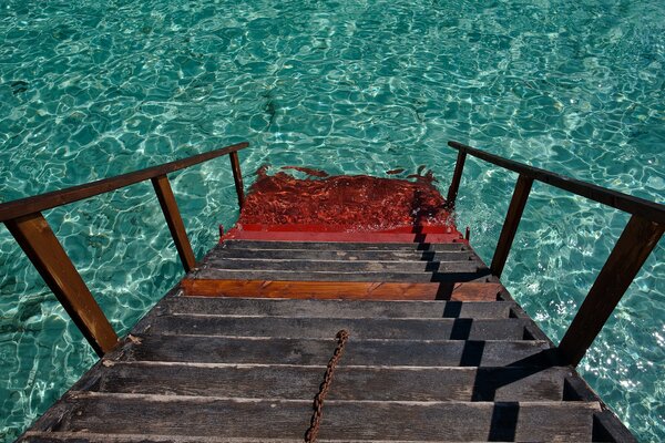 Stairs leading to the blue lagoon