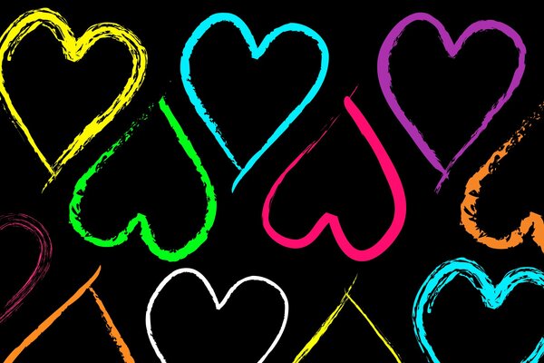 Hearts painted with paint in all colors of the rainbow