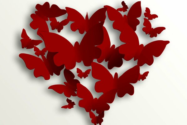 Red heart of flying butterflies