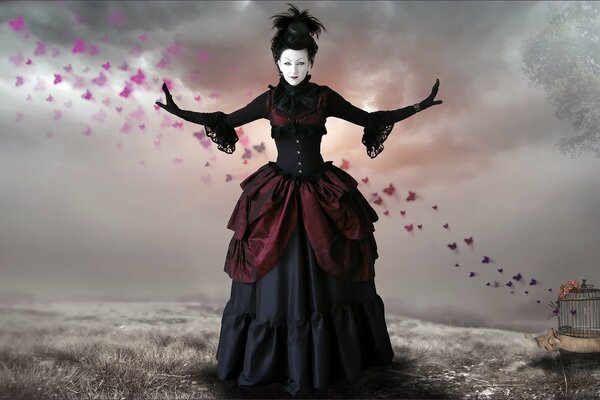 A woman in a black Gothic-style dress on a background of flying butterflies