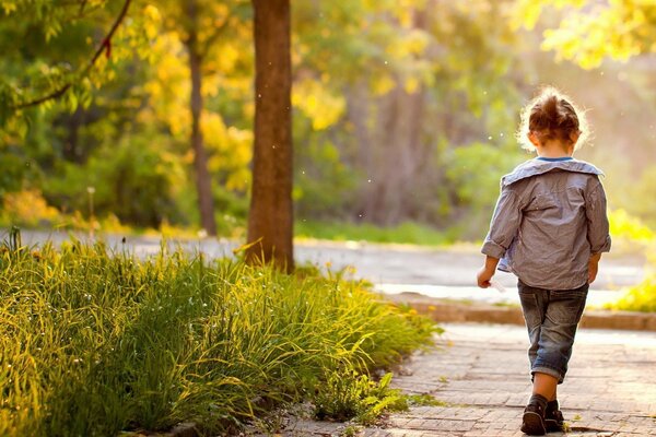 A little girl goes into the distance