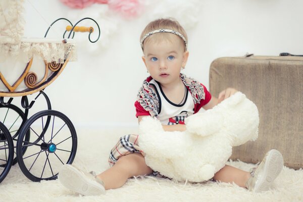 Photo shoot of a little girl with toys