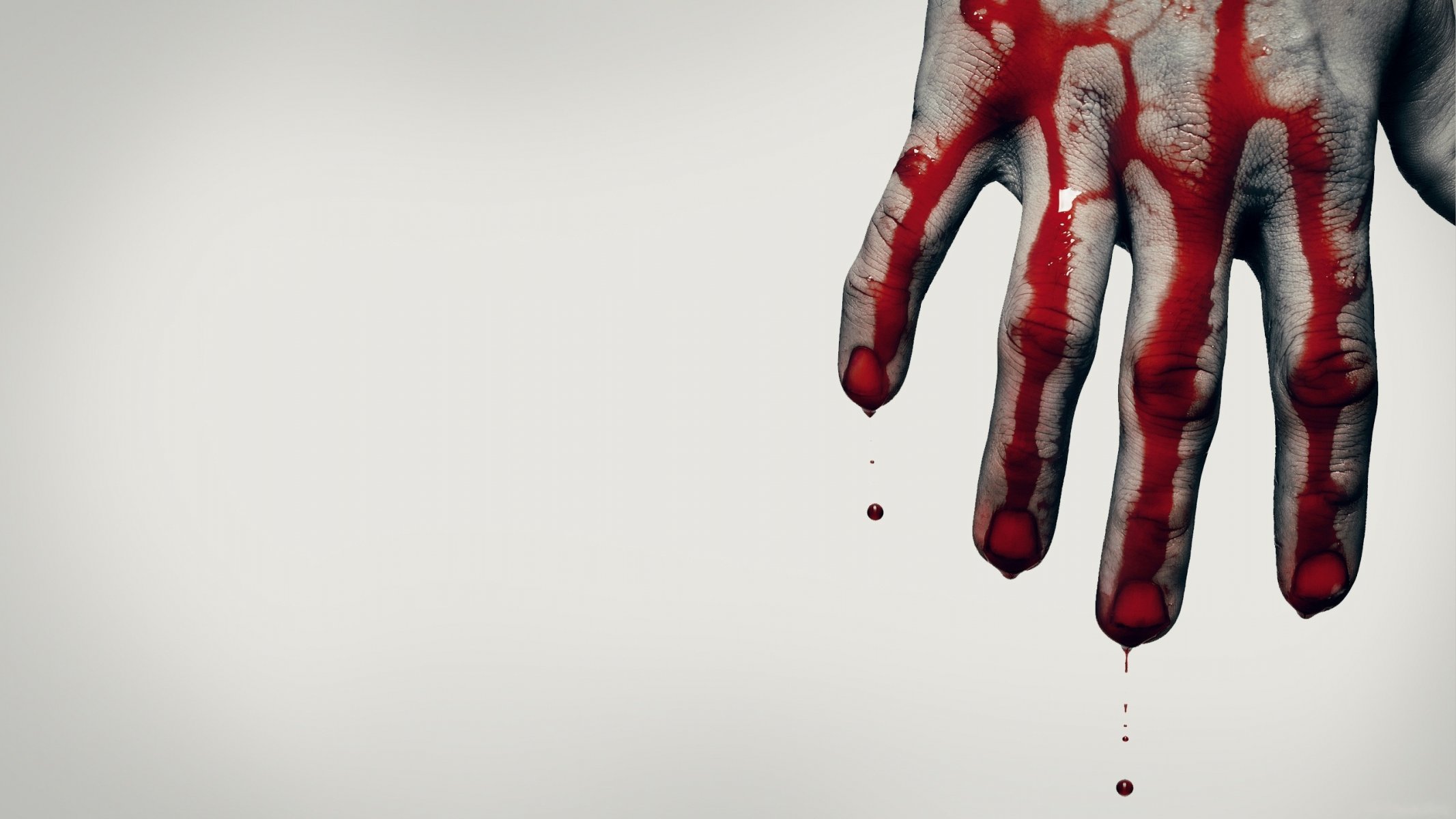 ituation hand blood gray background