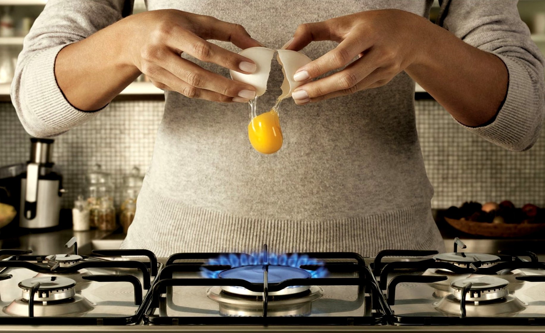 hands gas plate broken egg yolk motion