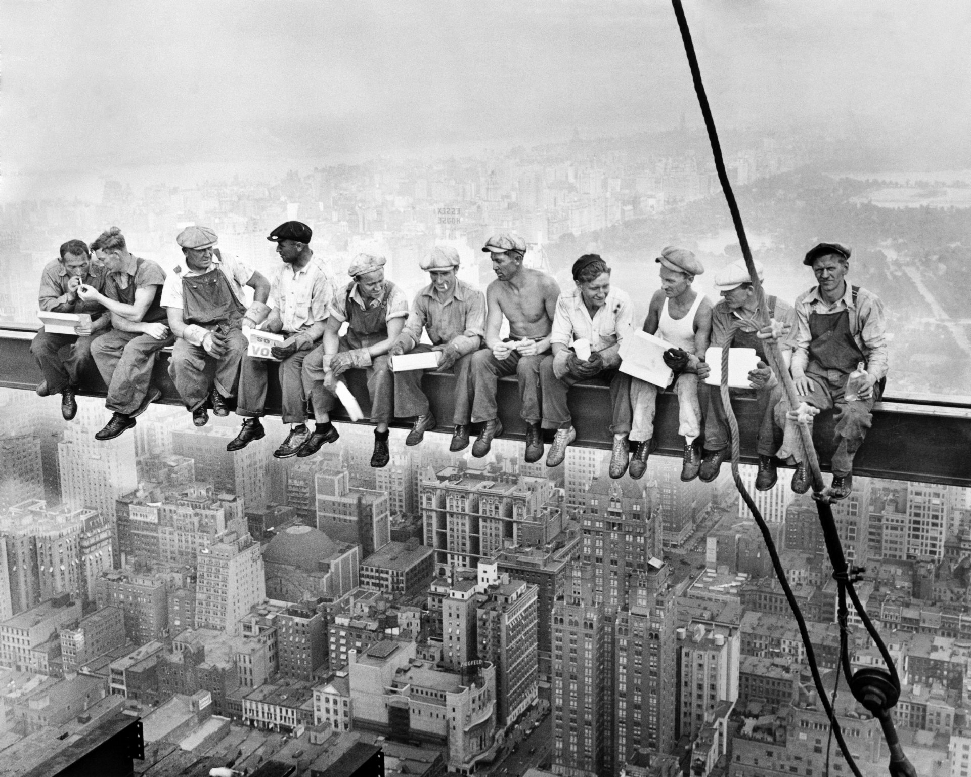 workers break smoke break sports bar height town skyscraper building new york history photo