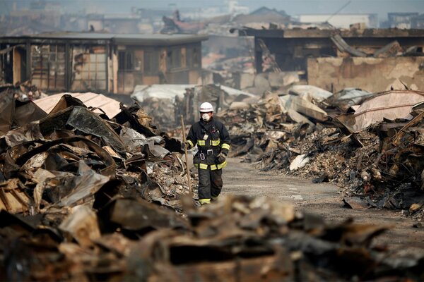 A rescuer amid the destruction after the earthquake