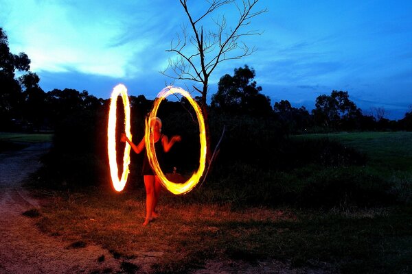 Brave girl and fire hoops