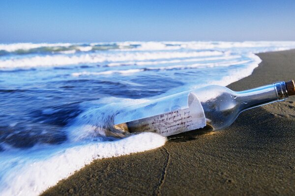 A bottle on the seashore with a message