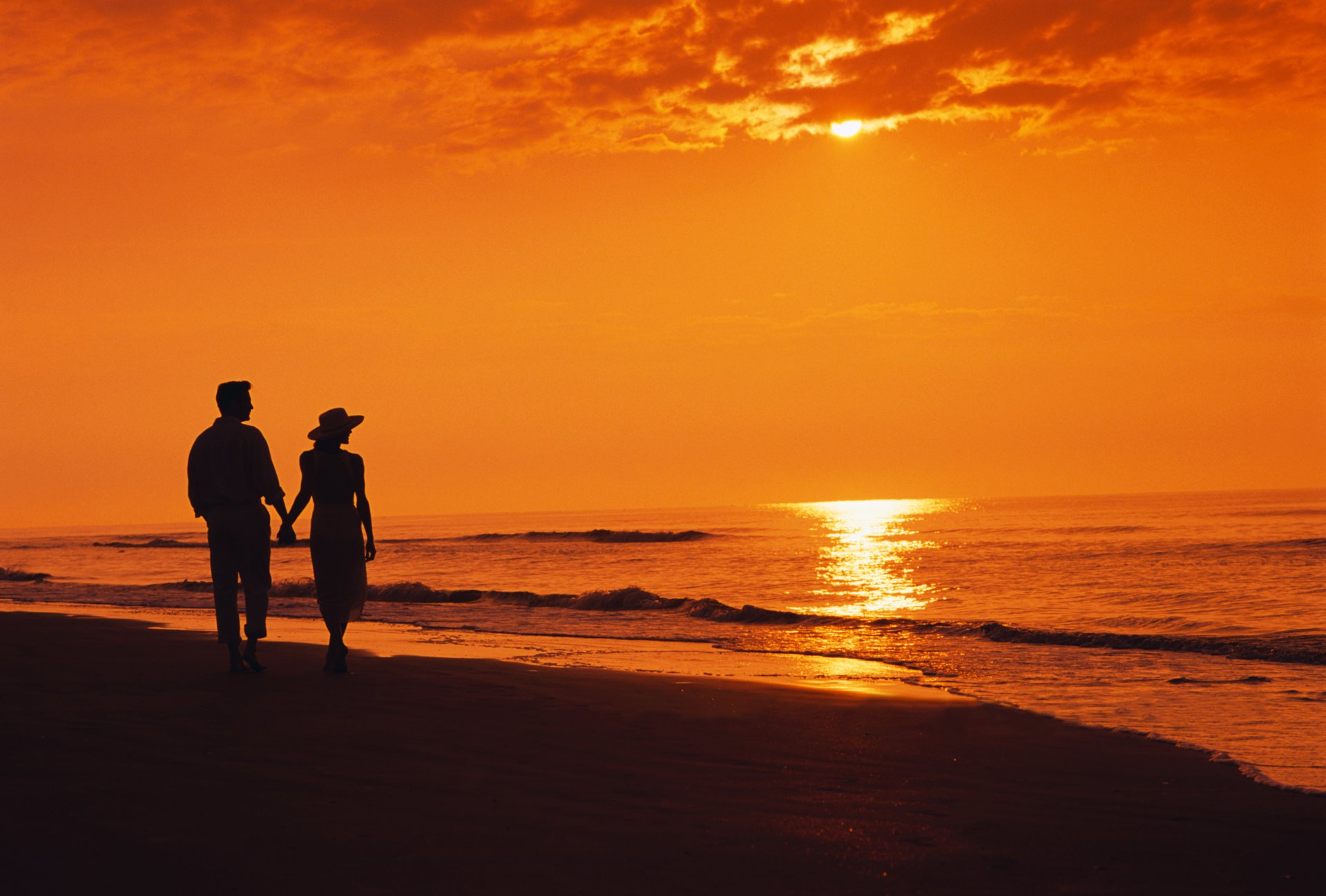 two evening sea beach silhouettes sunset tourism