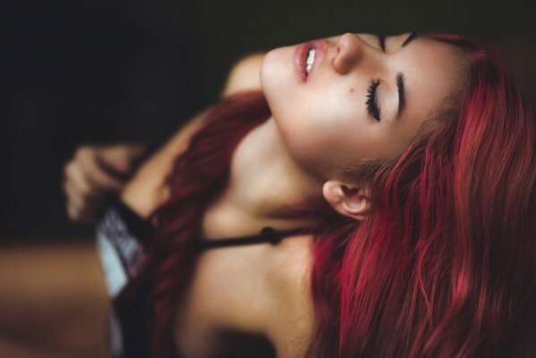 Girl with pink hair posing