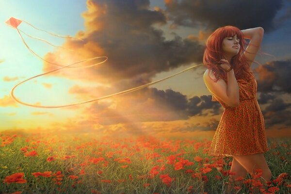 A girl in a field of beautiful flowers with a kite