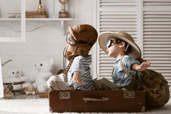 Boys play airplane travel