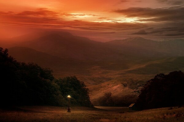 A lonely lantern on the background of beautiful mountains