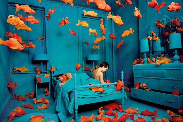 Blue bedroom with goldfish