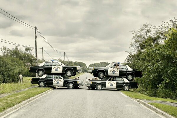 Such a cluster of wheelbarrows of cops can only be seen in the movie