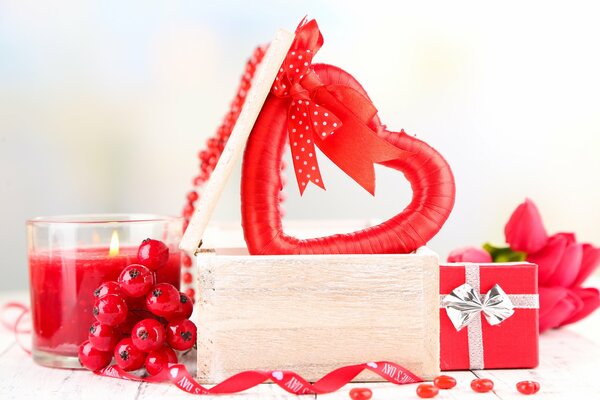 A red heart on a wooden box