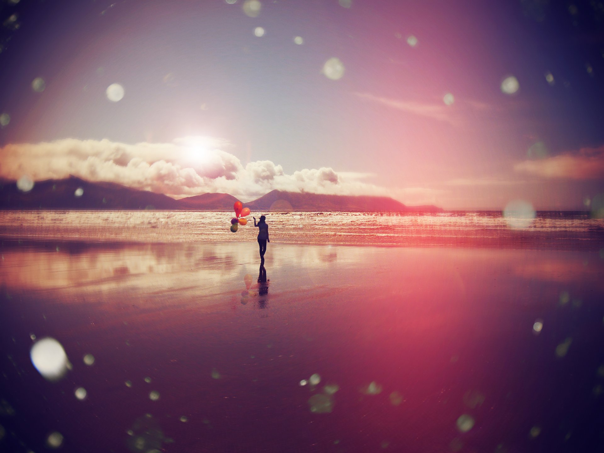 girl sea clouds balloons beach wave