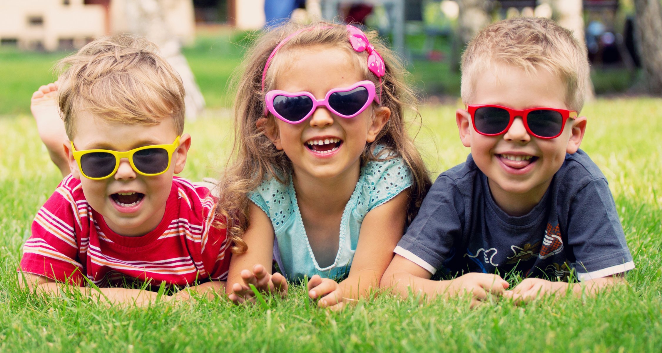 girl boys children happiness sunglasses lawn