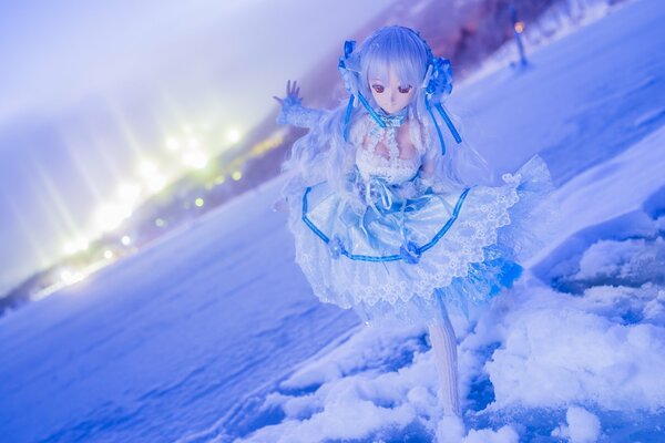 Winter landscape with an anime doll