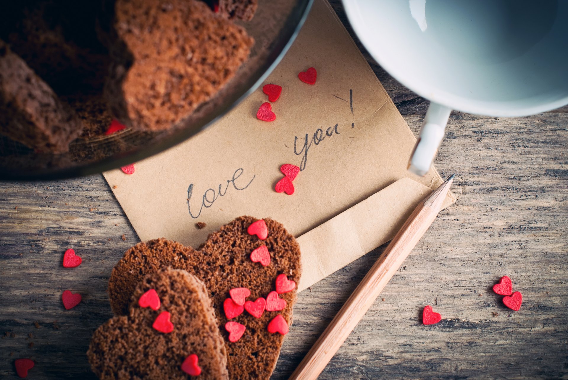 galletas pasteles corazones corazón taza lápiz sobre carta te amo