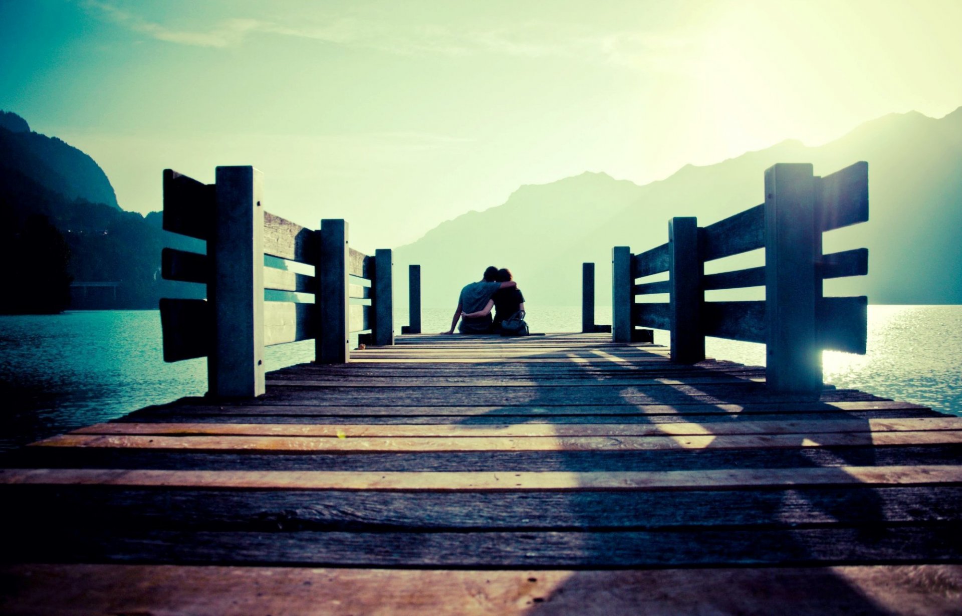 mood the pair couple girl guy men a woman sports pier bridge sea water mountain sun sky man love romance background wallpaper widescreen full screen hd wallpapers fullscreen