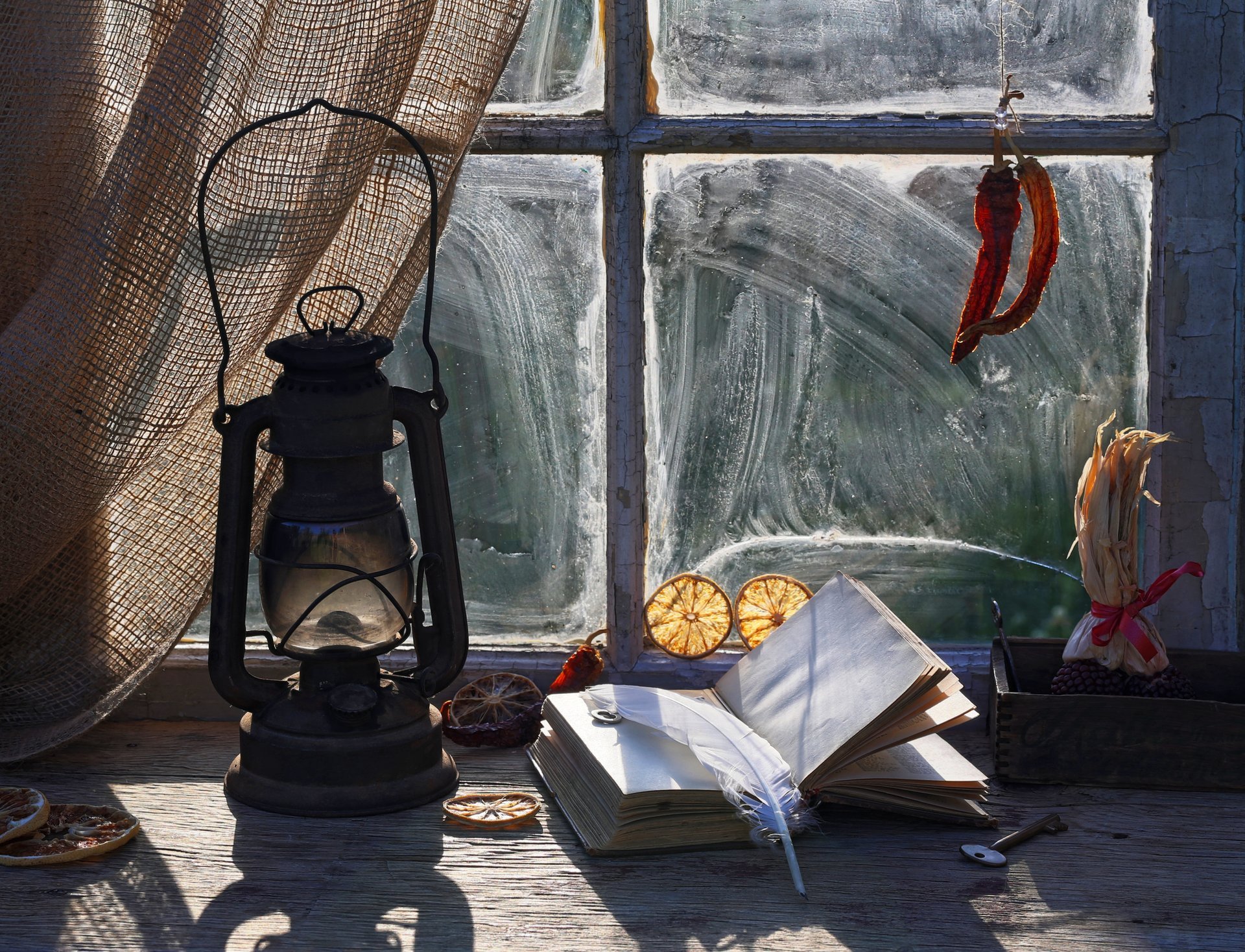 vintage vintage book window sill glasses keys pen pepper kerosene lamp window dust orange