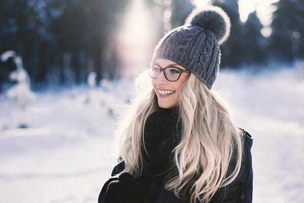 Winter landscape and a girl on the background