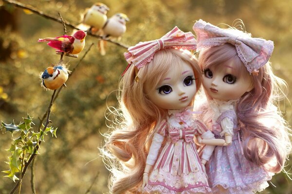 Dolls in a dress with bows