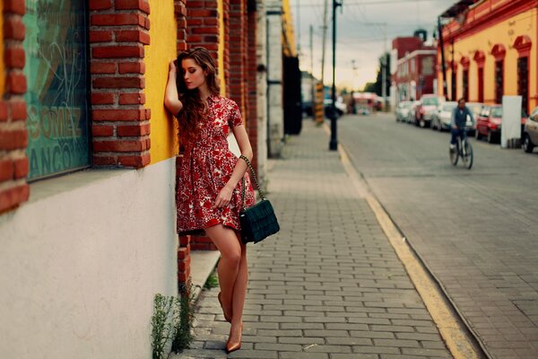 A girl in a dress on the street