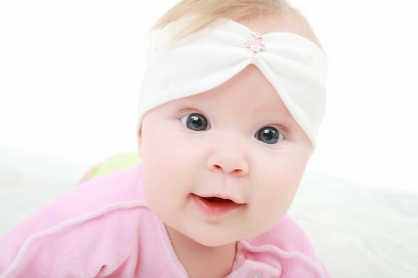 A little princess in a white headband