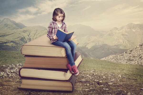 A girl reading books in nature