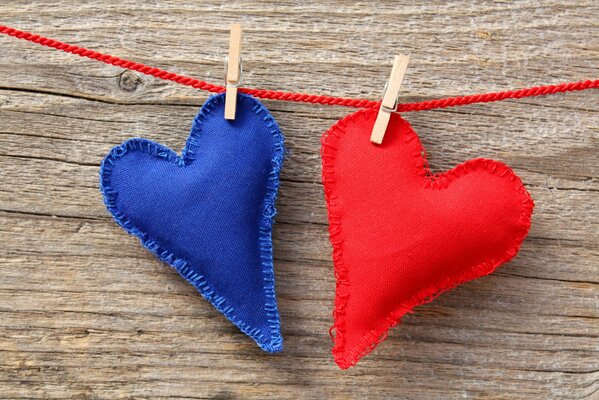 Red and blue hearts on clothespins