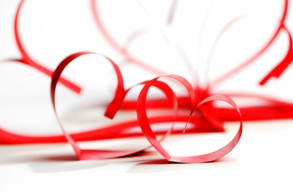 Red ribbon in the shape of a heart