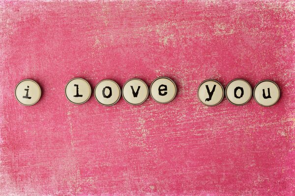 The inscription I love you on a pink background