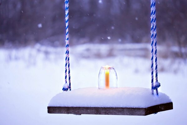 Candle on the swing alone