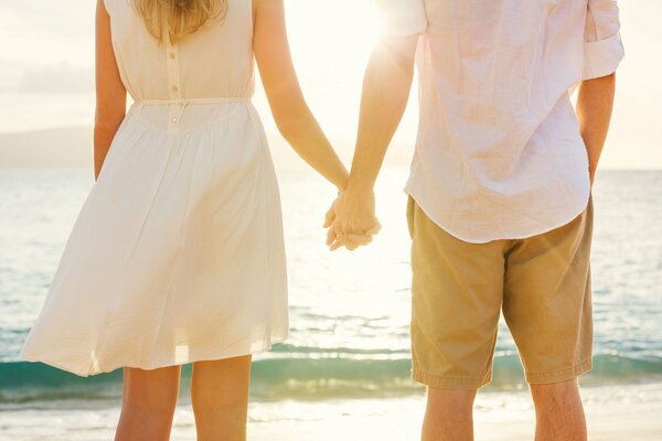 Guy with a girl on the seashore