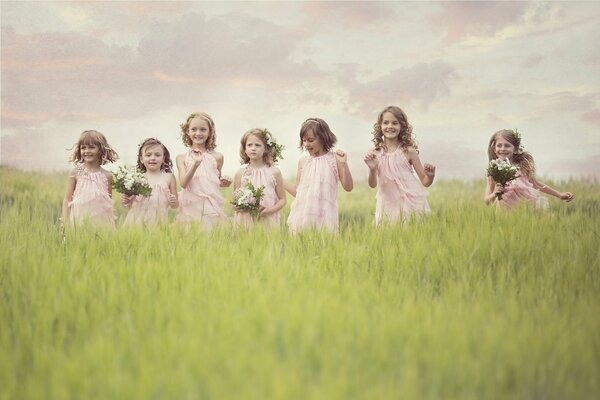 Little fairies in a green meadow