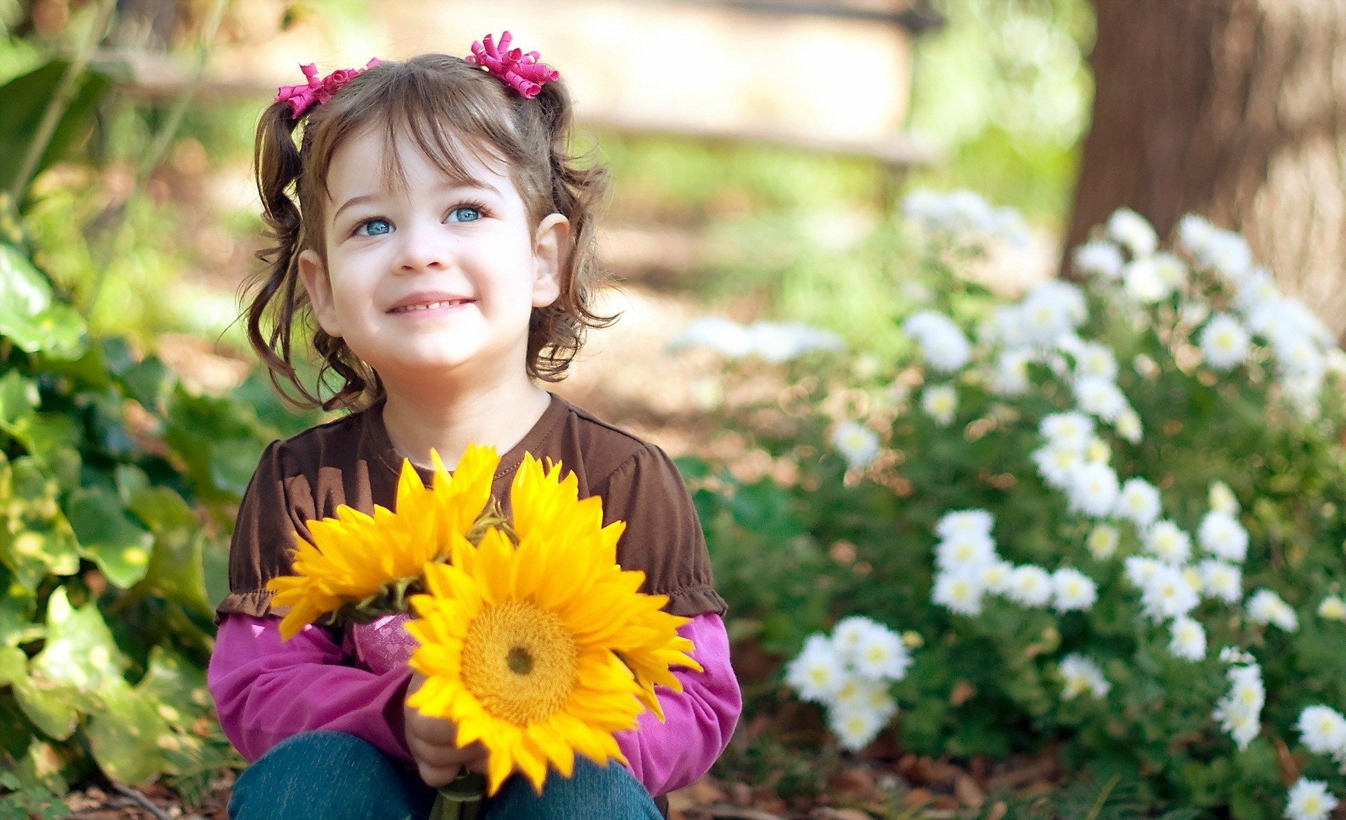 moods children girl smile joy face look flowers flowers sunflowers daisies leaves nature background wallpaper