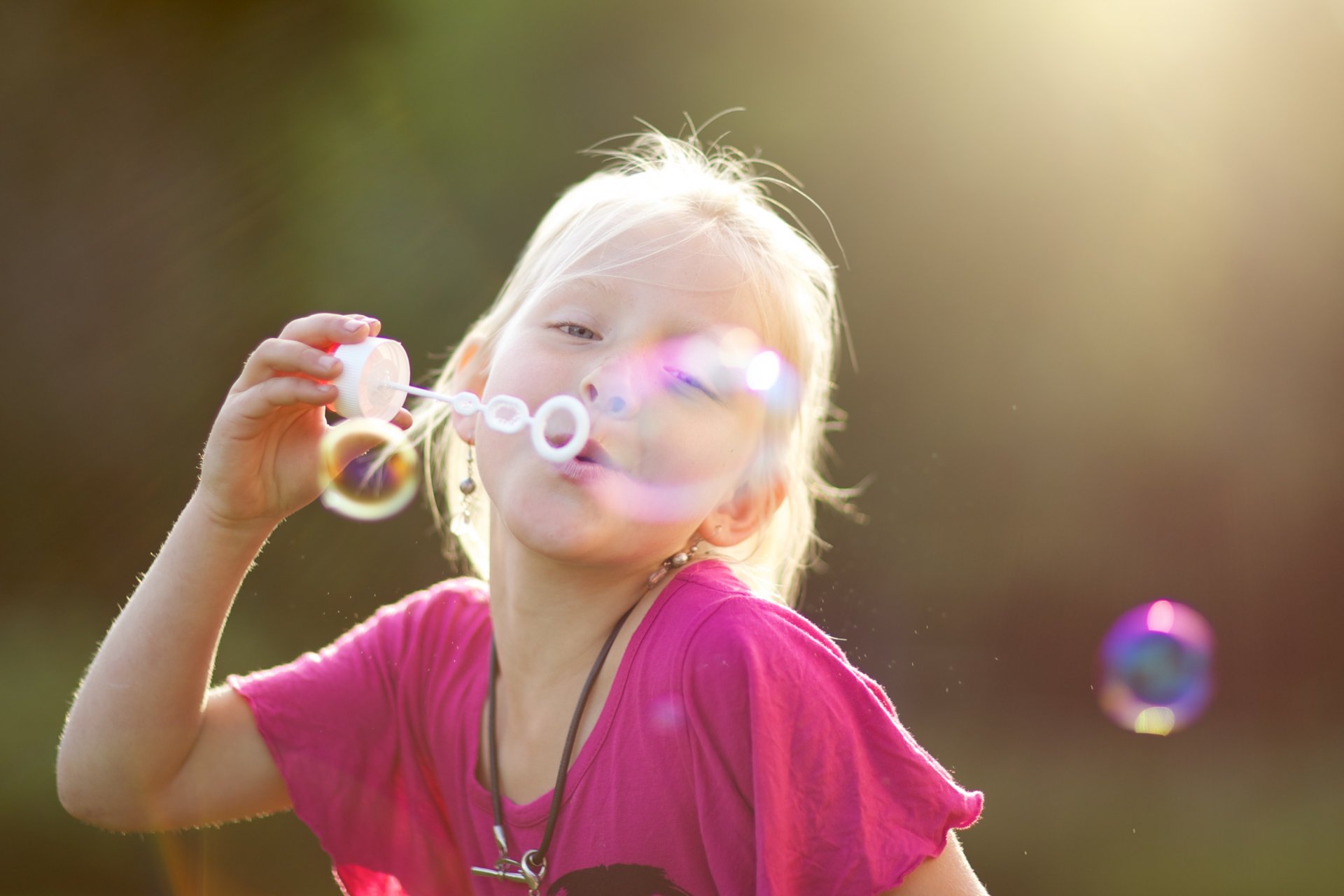 mood children girl pink bubbles nature background . wallpaper