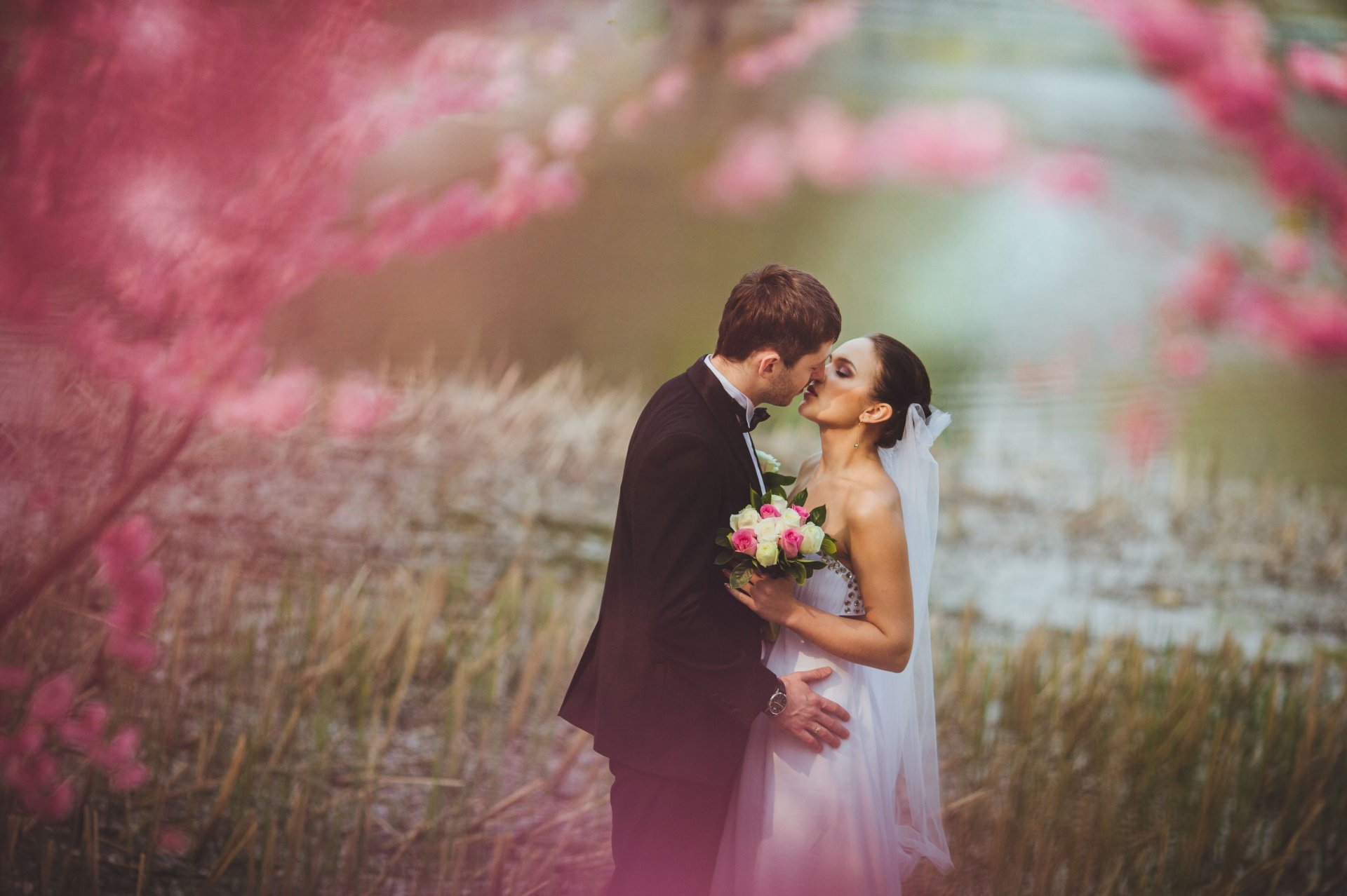 moods girl guy man woman couple bride groom wedding wedding dress suit tuxedo veil flowers flowers bouquet bouquet clock tenderness kiss nature pink background wallpaper widescreen fullscreen widescreen wal