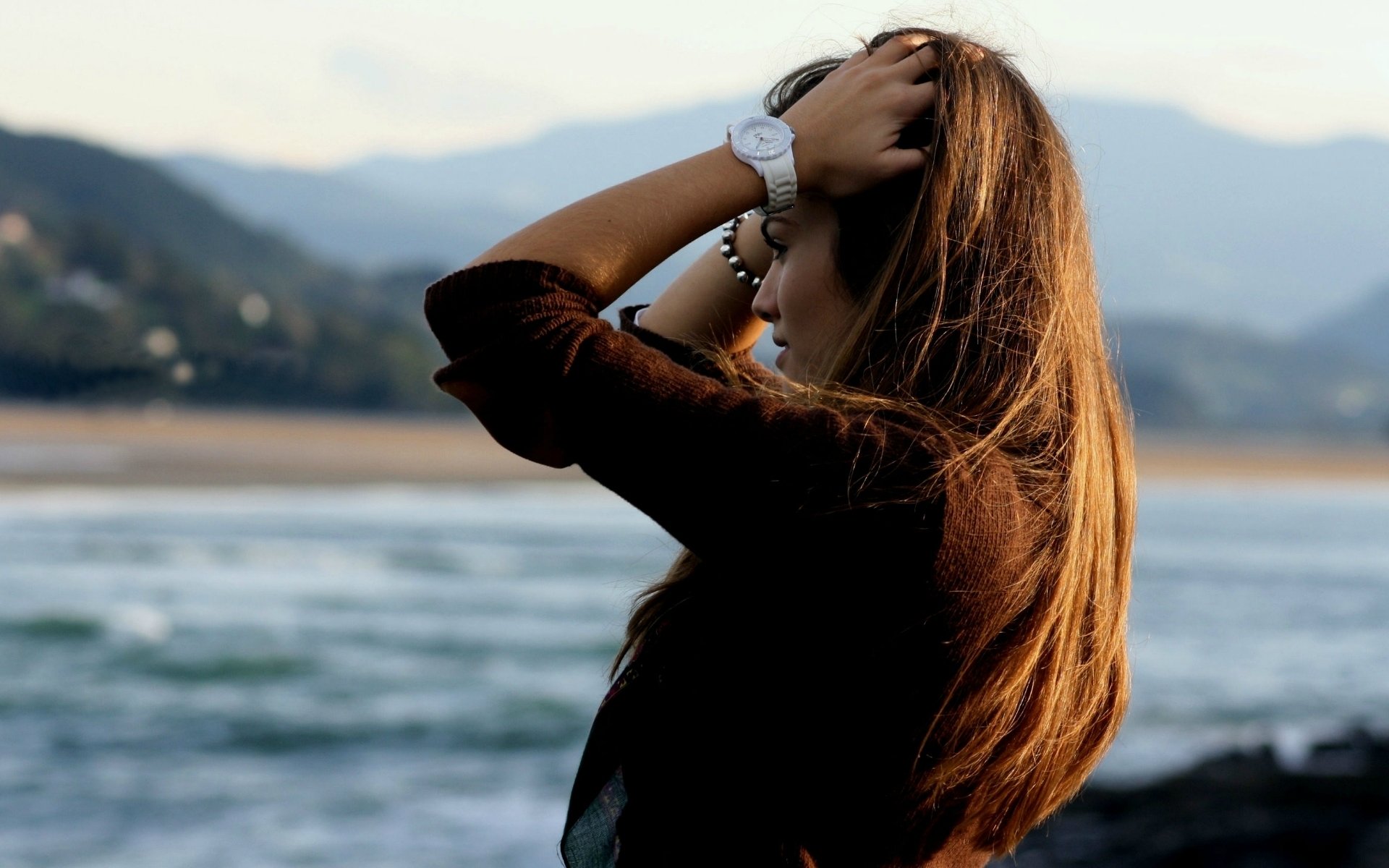 mood girl brown hair view watches hands accessories sea river background blur wallpaper widescreen full screen hd wallpaper