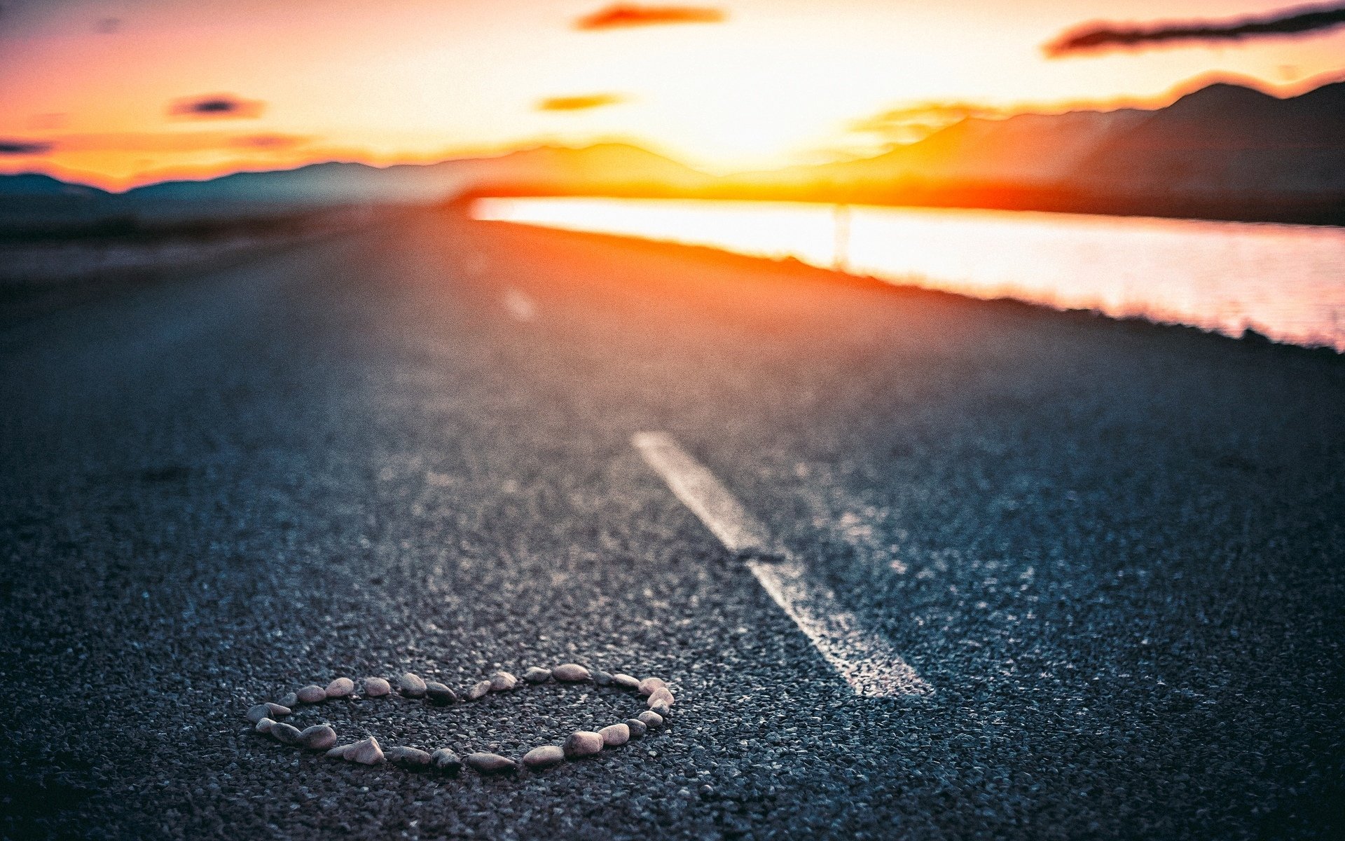 moods road stones pebbles heart heart love asphalt water river sunset sun sky clouds blur background wallpaper widescreen fullscreen widescreen