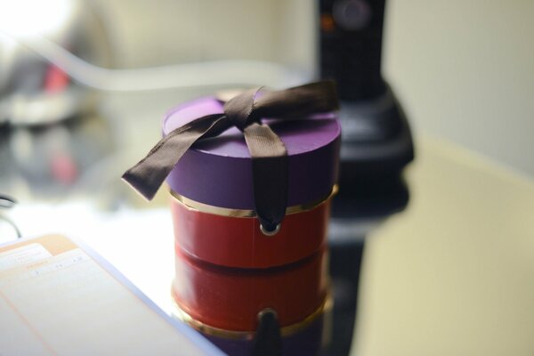 A gift in a purple mood box