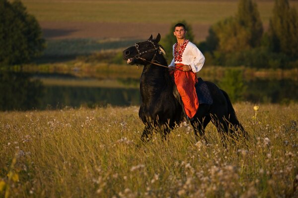 A man on a horse in Ukrainian clothes