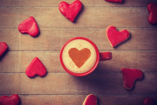 Mood mug with a heart on the desktop