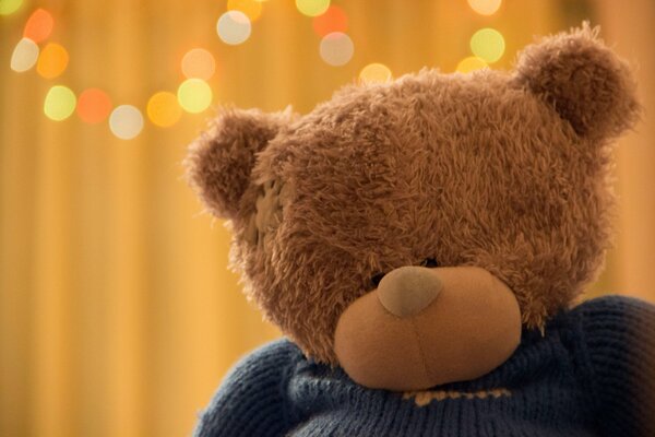 Teddy bear is waiting for the holiday