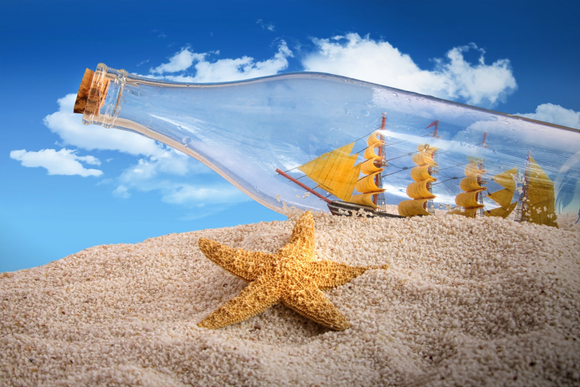 sand seestern flasche korken schiff segel himmel wolken kreativ