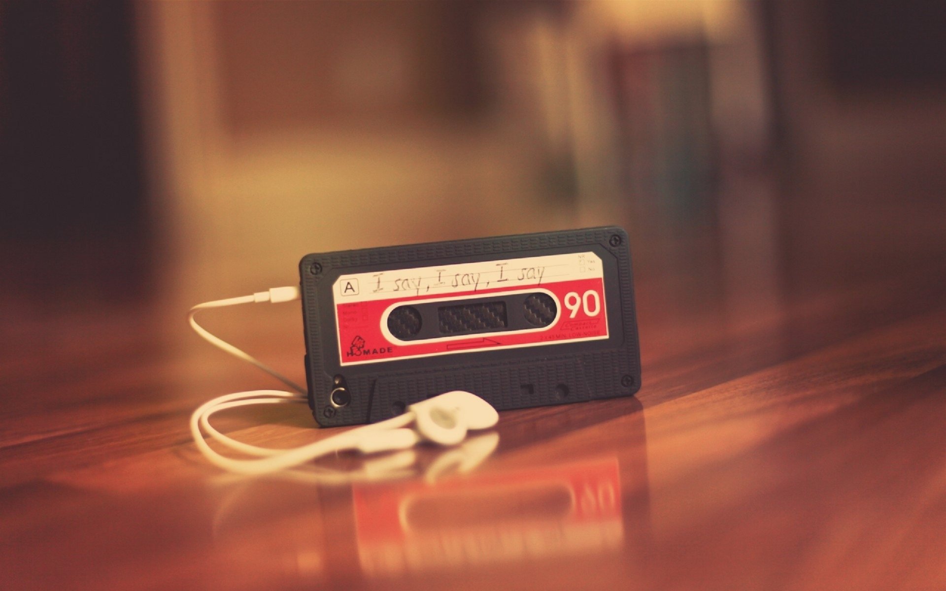 estado de ánimo auriculares reproductor casete música tono de llamada. canción mesa. rojo fondo papel pintado